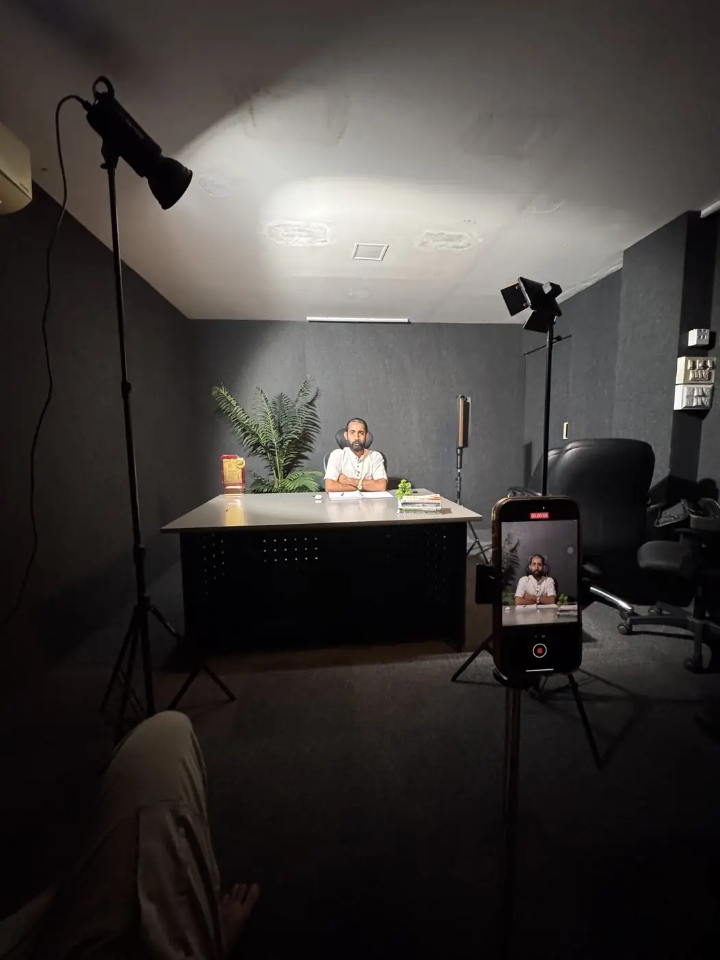Desk interview filmed on a phone rig
